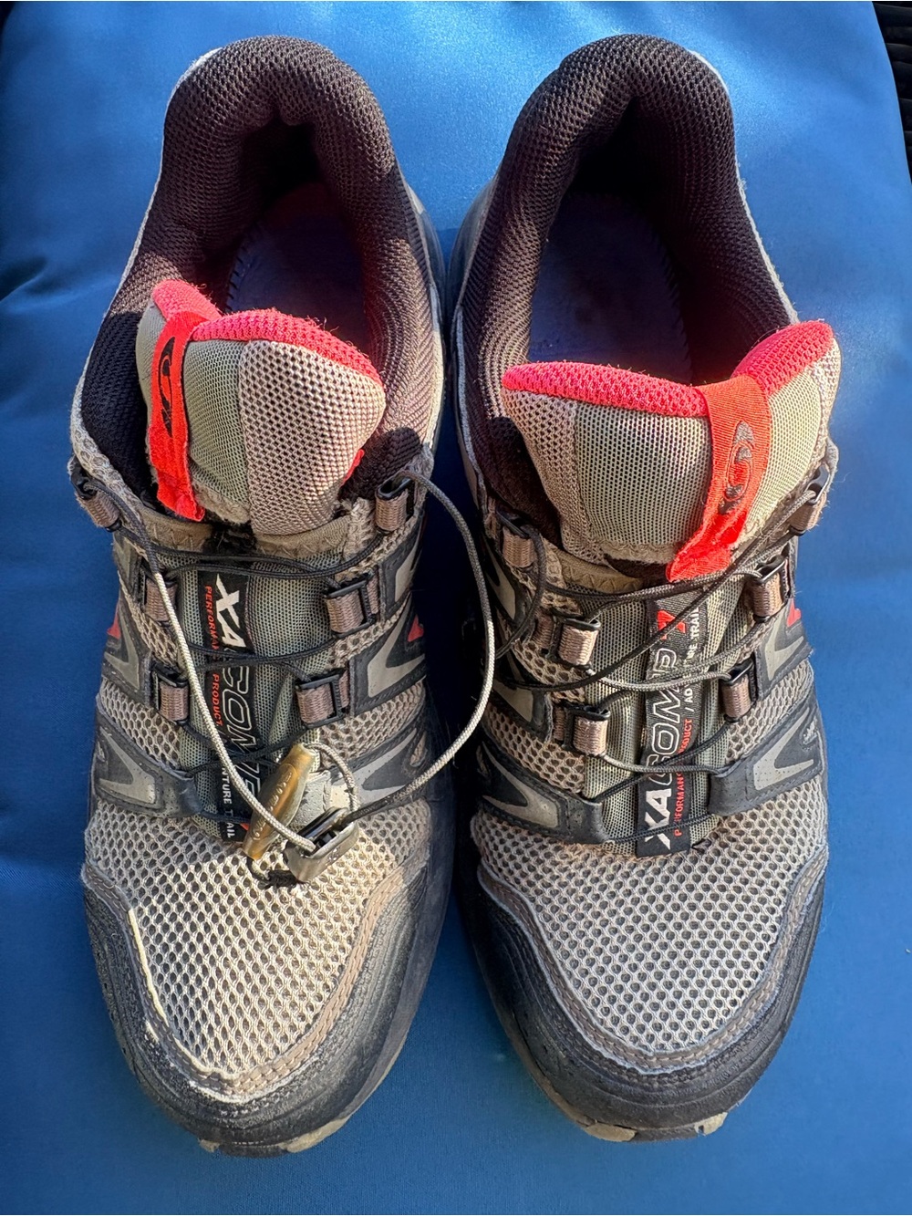 Salomon women’s Trail Shoes in Brown with Red Accents